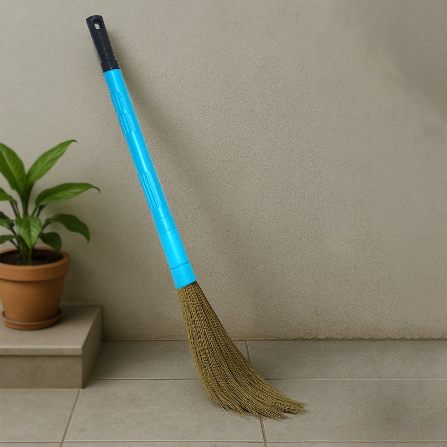 Telescopic plastic handle on expandable floor broom