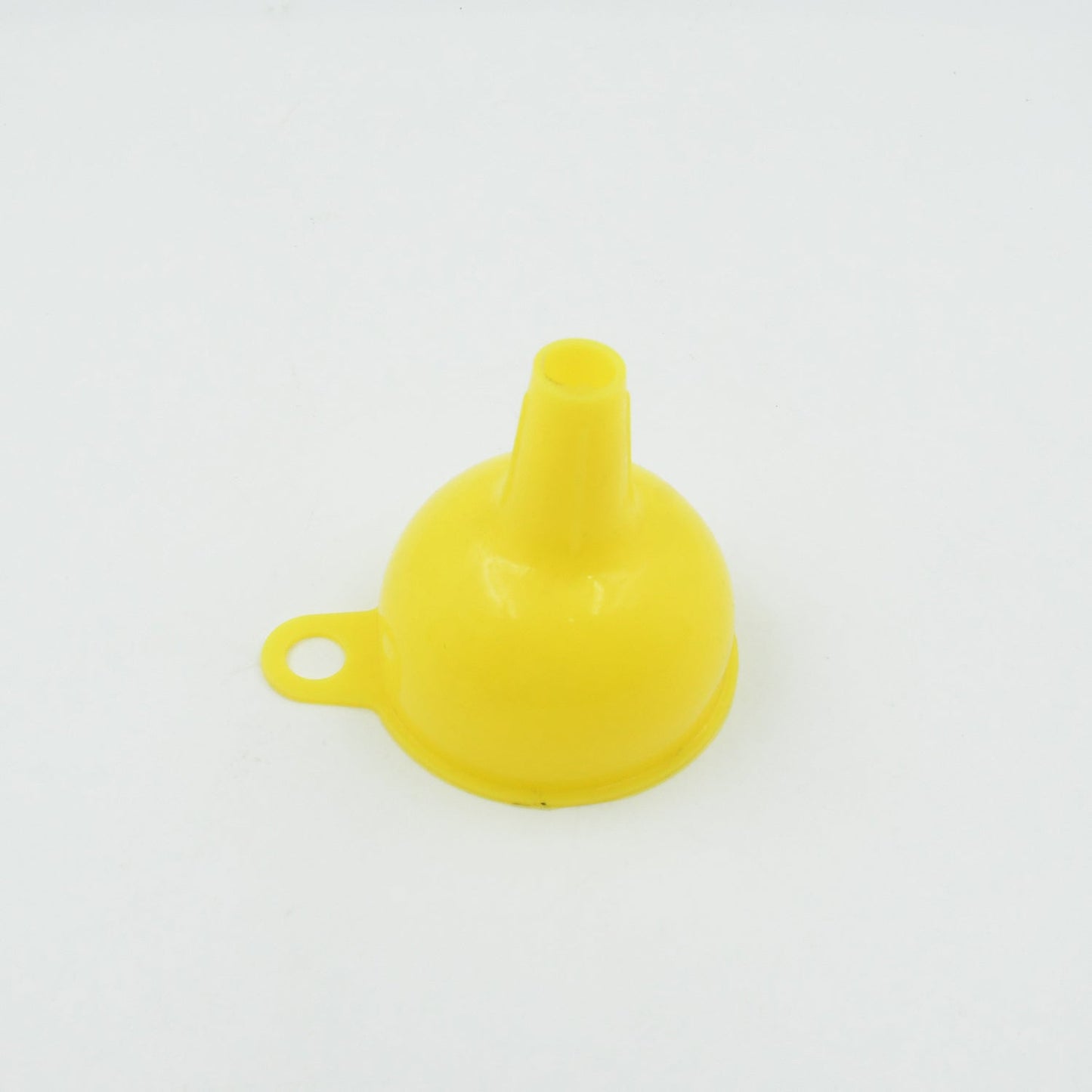 Bright yellow silicone funnel, a practical and colorful addition to any kitchen.