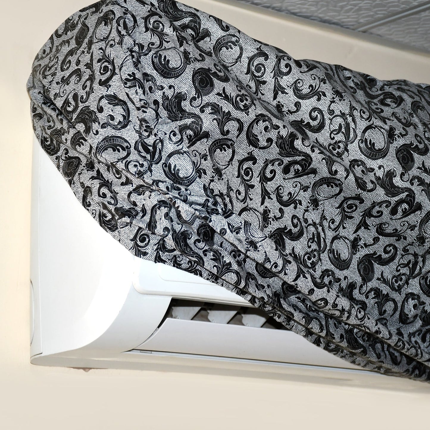 Air conditioner with protective Stretchable AC cover featuring dust and insect shield