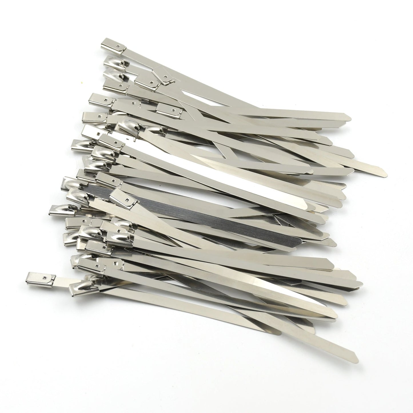 An array of durable stainless steel cable ties laid out, highlighting their uniform design and quality.