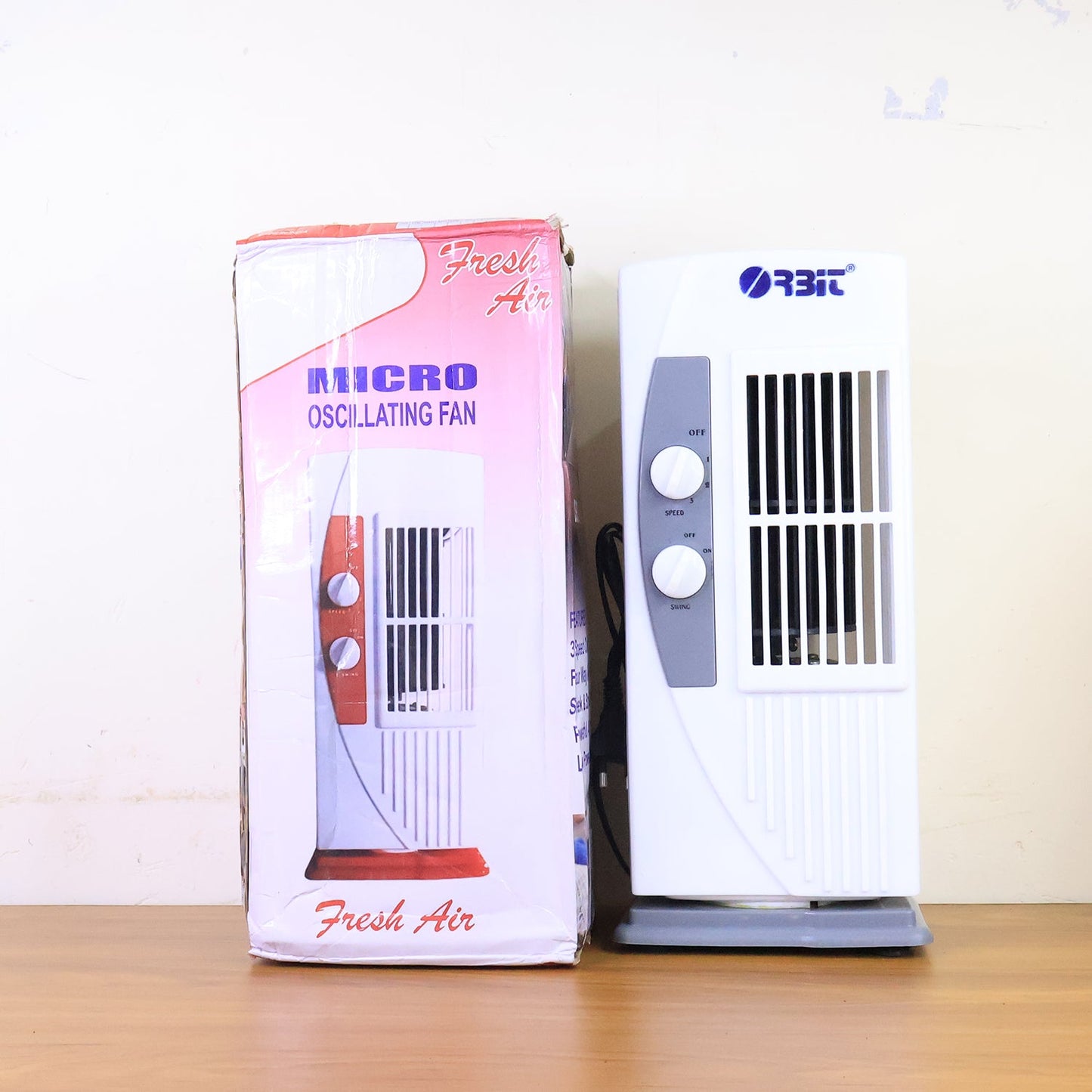 Top view of Orbit micro oscillating tower fan with control panel