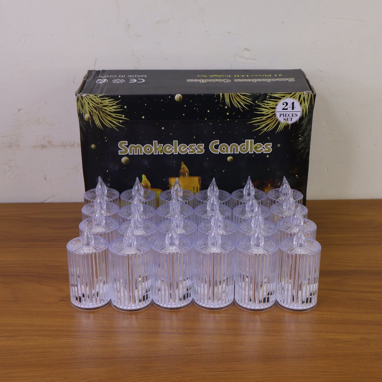 Collection of 24 safe, reusable LED flameless decorative candles ideal for festive decor