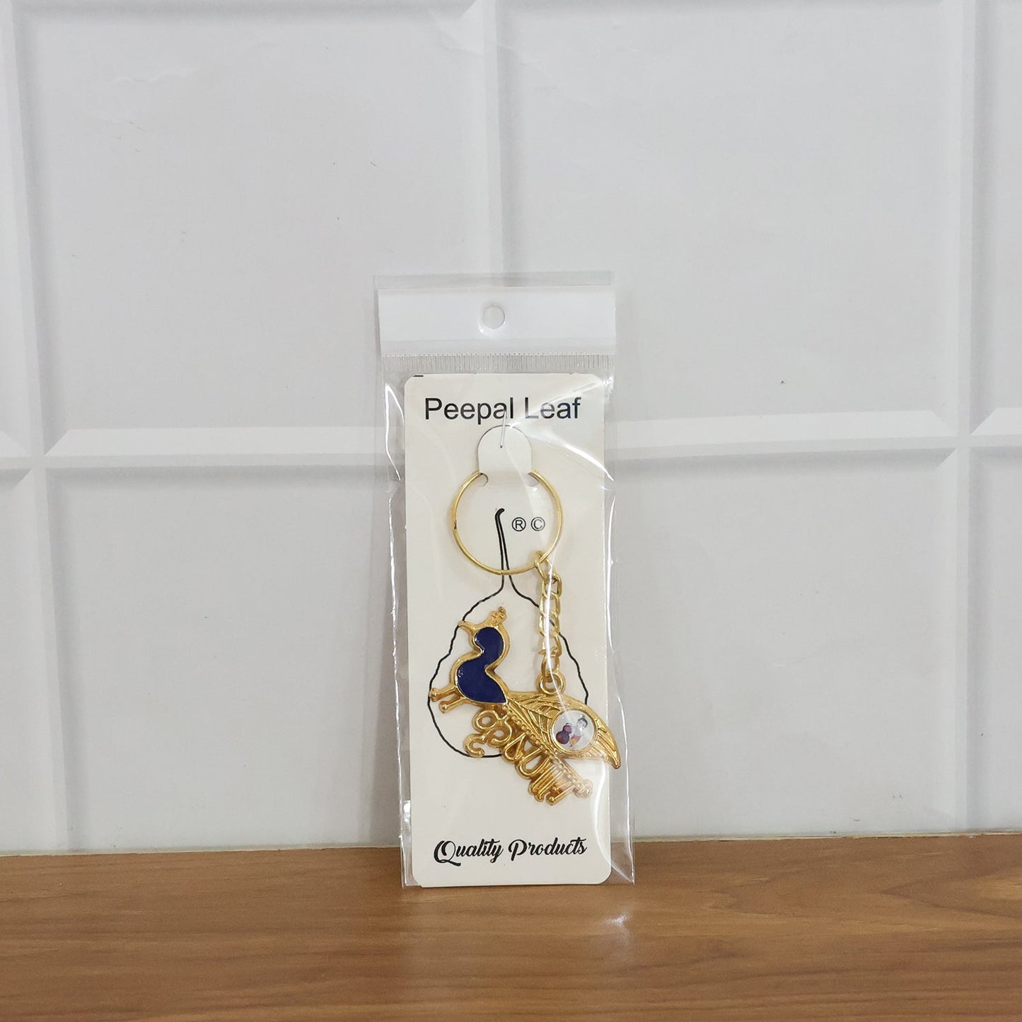 Krishna keychain with multiple charms and sturdy metal key ring