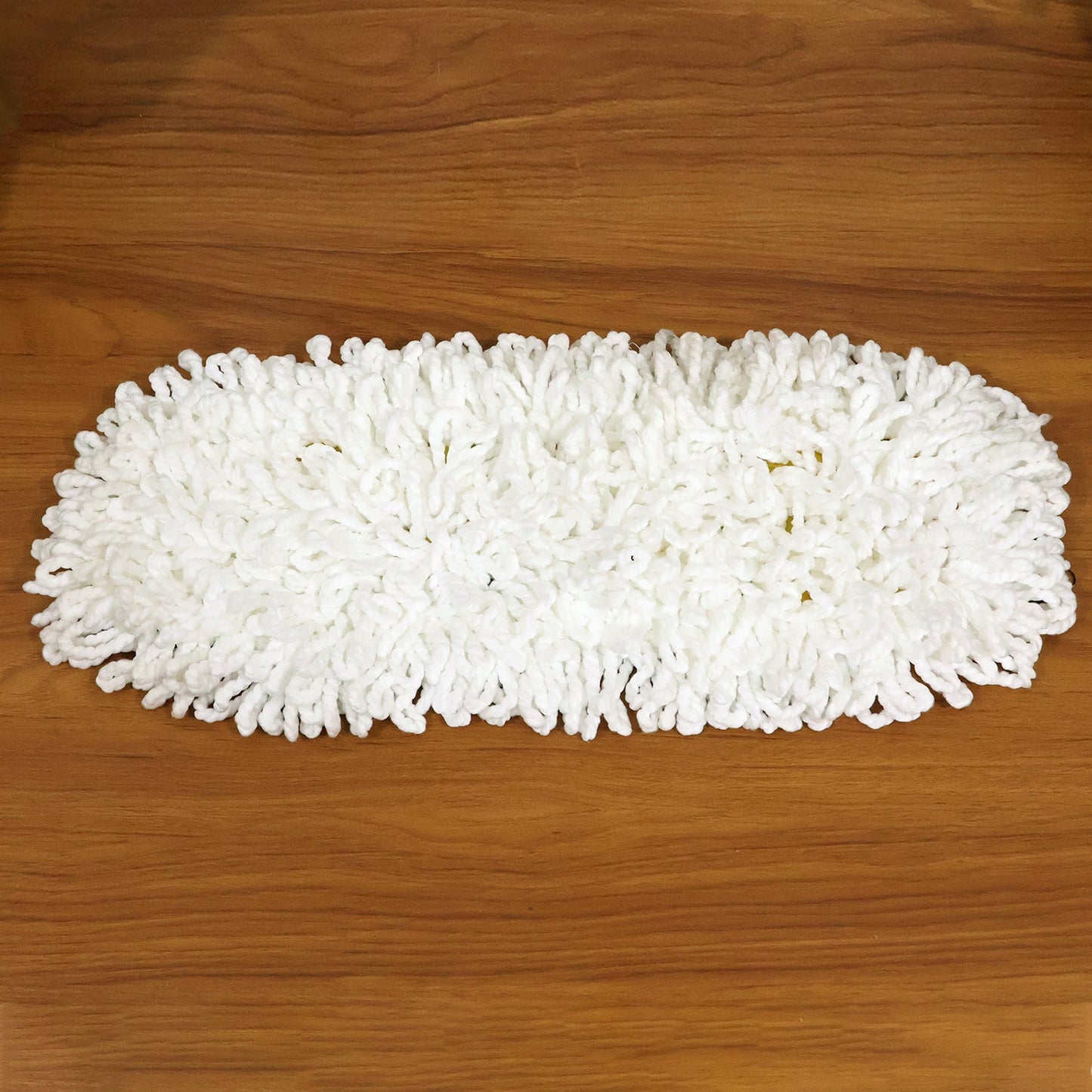 Detailed close-up of the textured surface of the dust mop refill head.