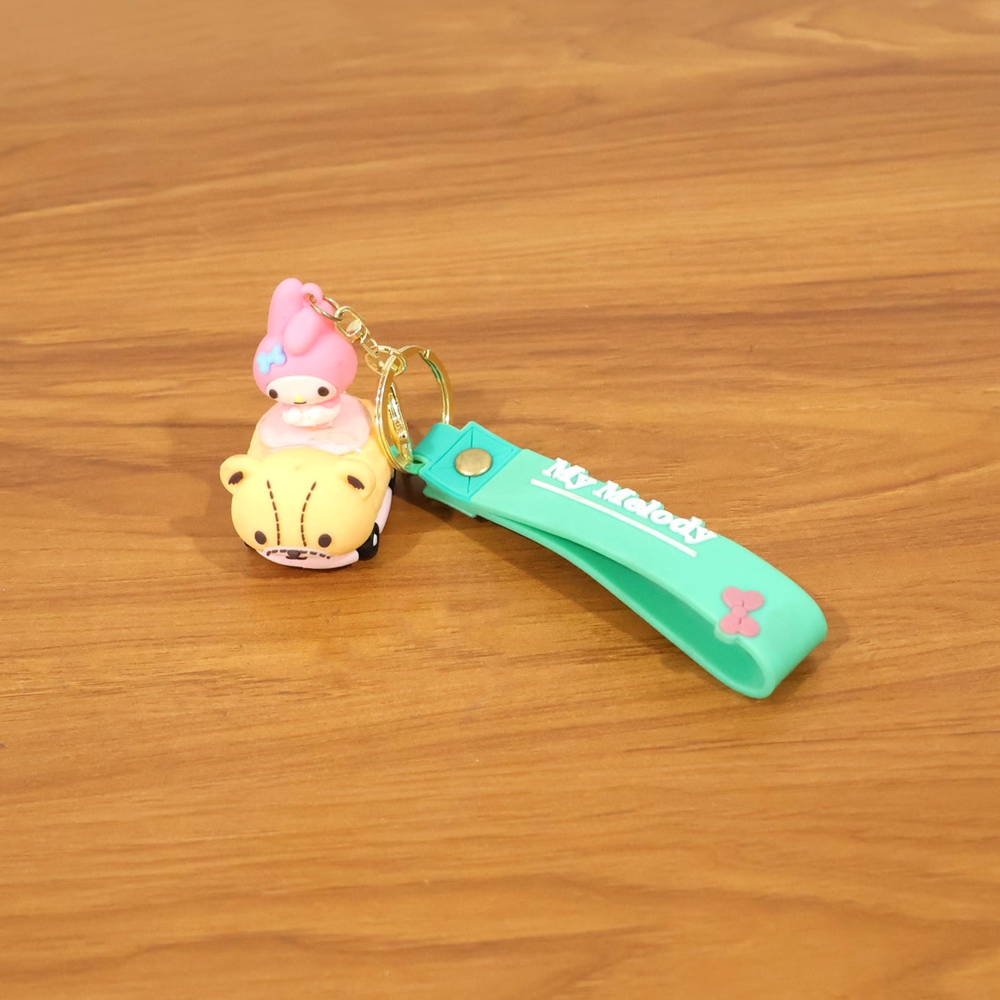 Playful cartoon charm key holder designed for kids and students