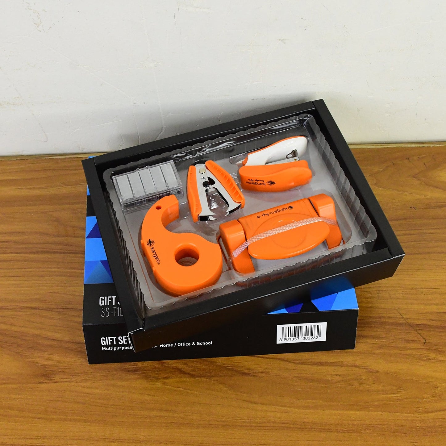 Close-up of tape dispenser and staple remover in gift set