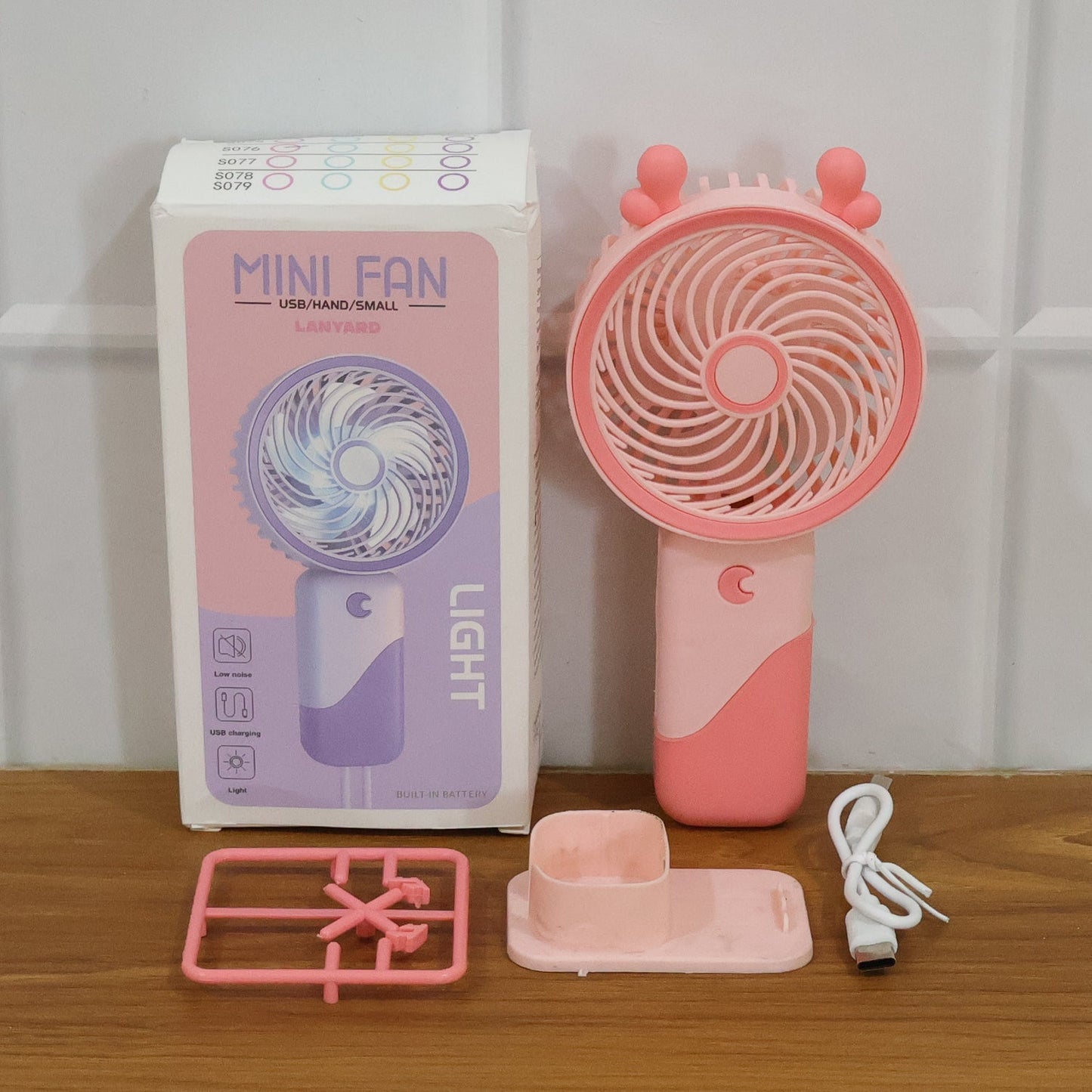 Quiet portable mini fan with foldable stand and LED light