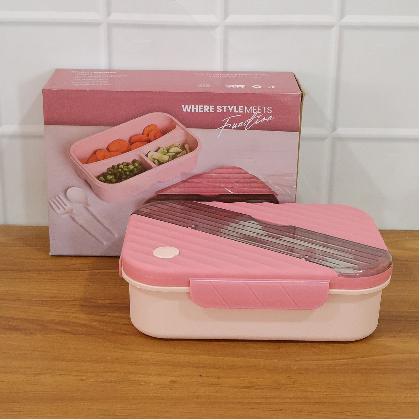 Portable kids lunch container with secure lid and cutlery included