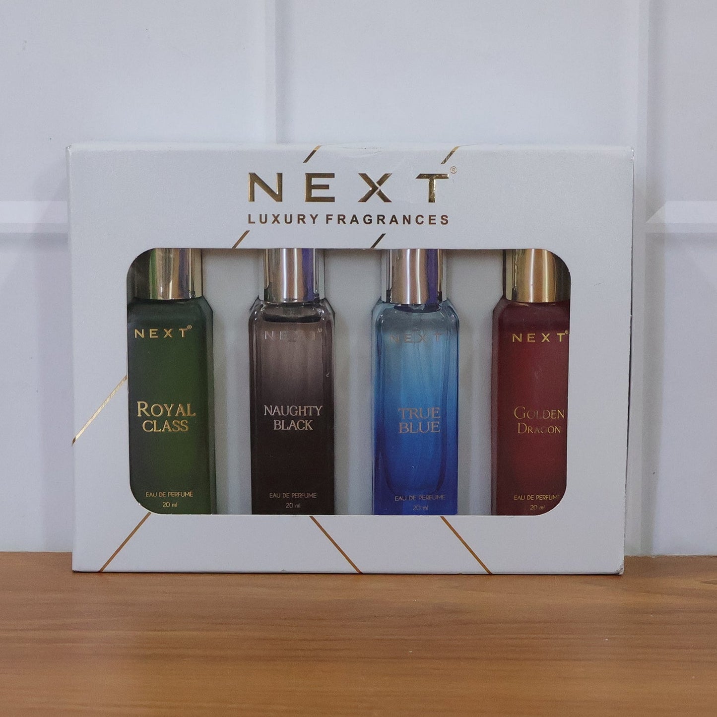 Premium mini fragrance gift pack with four bottles