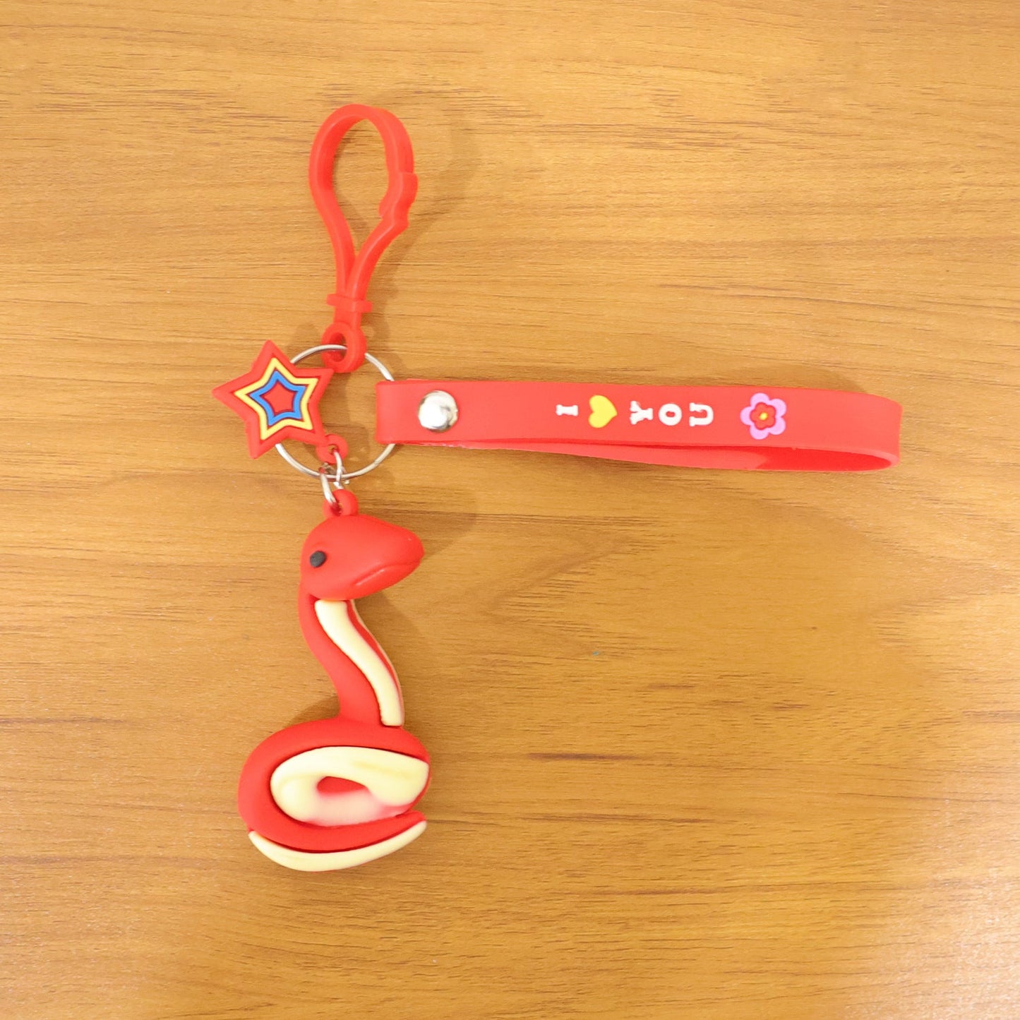Novelty snake shaped key ring and bag accessory for children