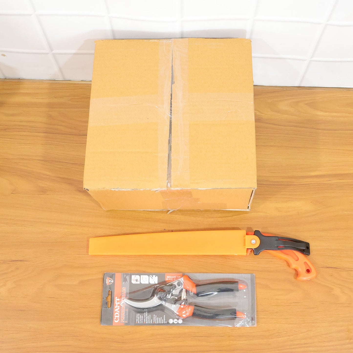 Heavy duty pruning shears and hand saw for effective garden care