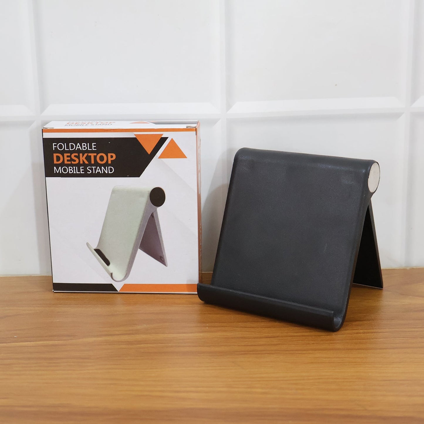 Close-up image of foldable desktop mobile stand highlighting sturdy plastic material