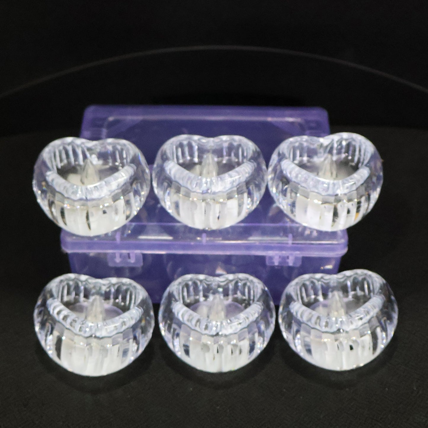 Battery powered LED crystal tealight candles set illuminating room
