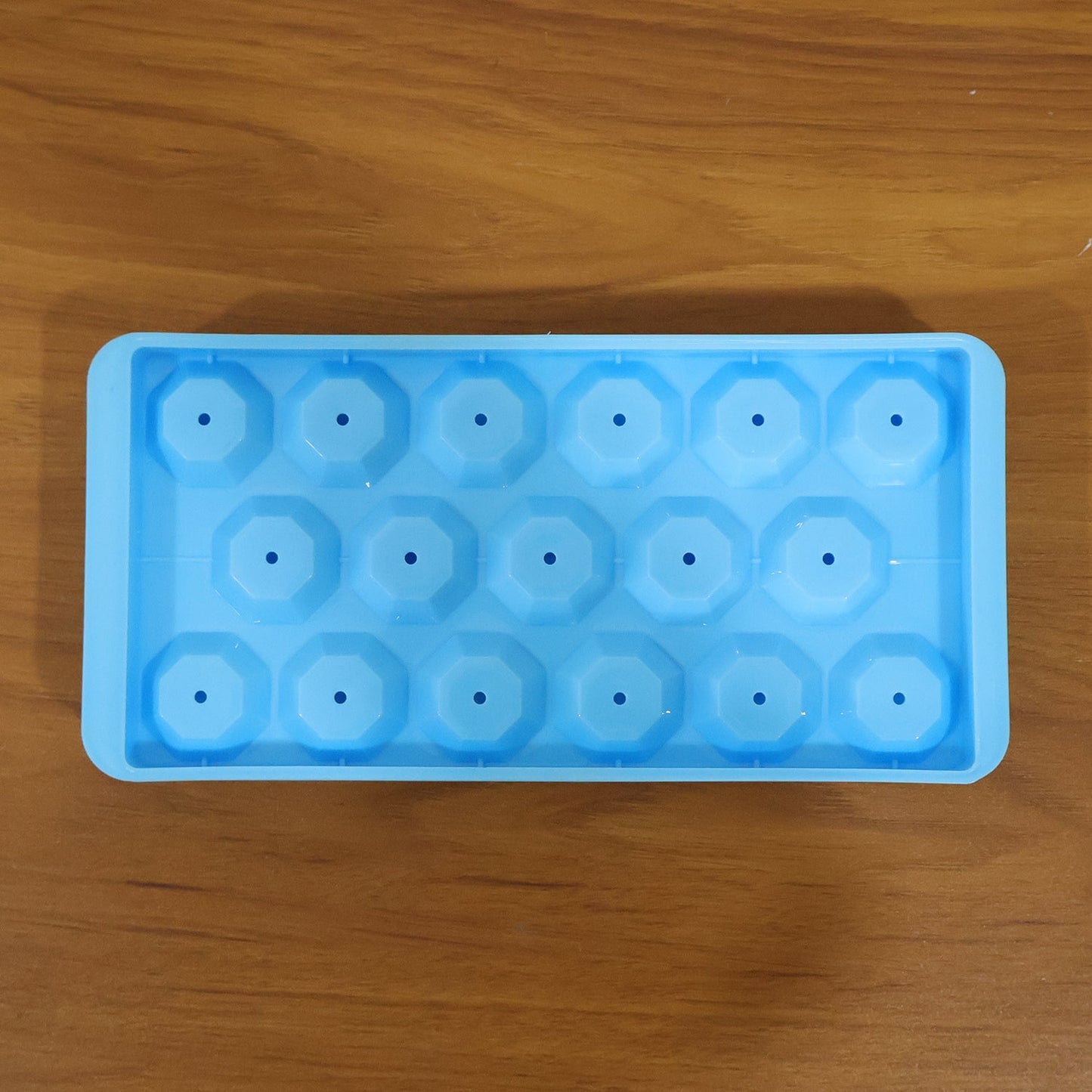 Square ice cubes in flexible tray for freezer use