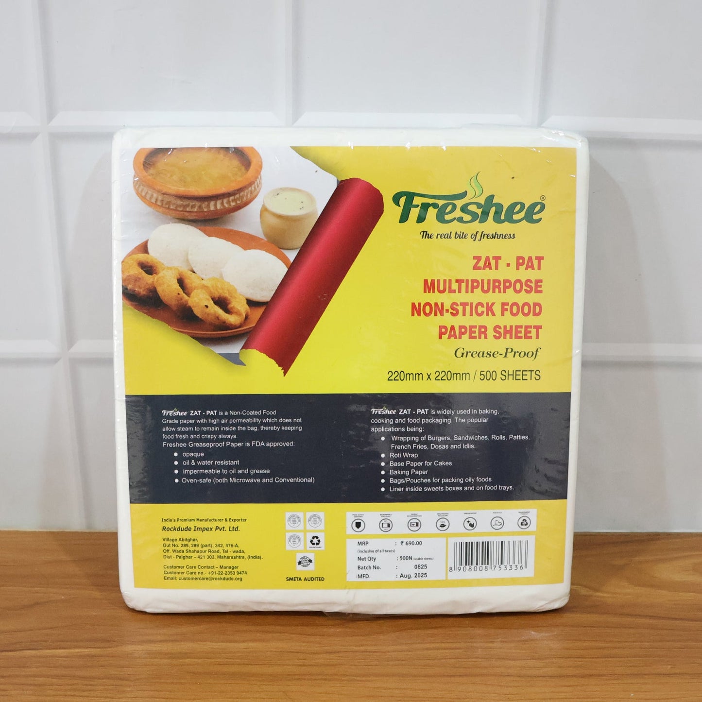 Zat-Pat display showing multiple non-stick food paper sheets for various foods