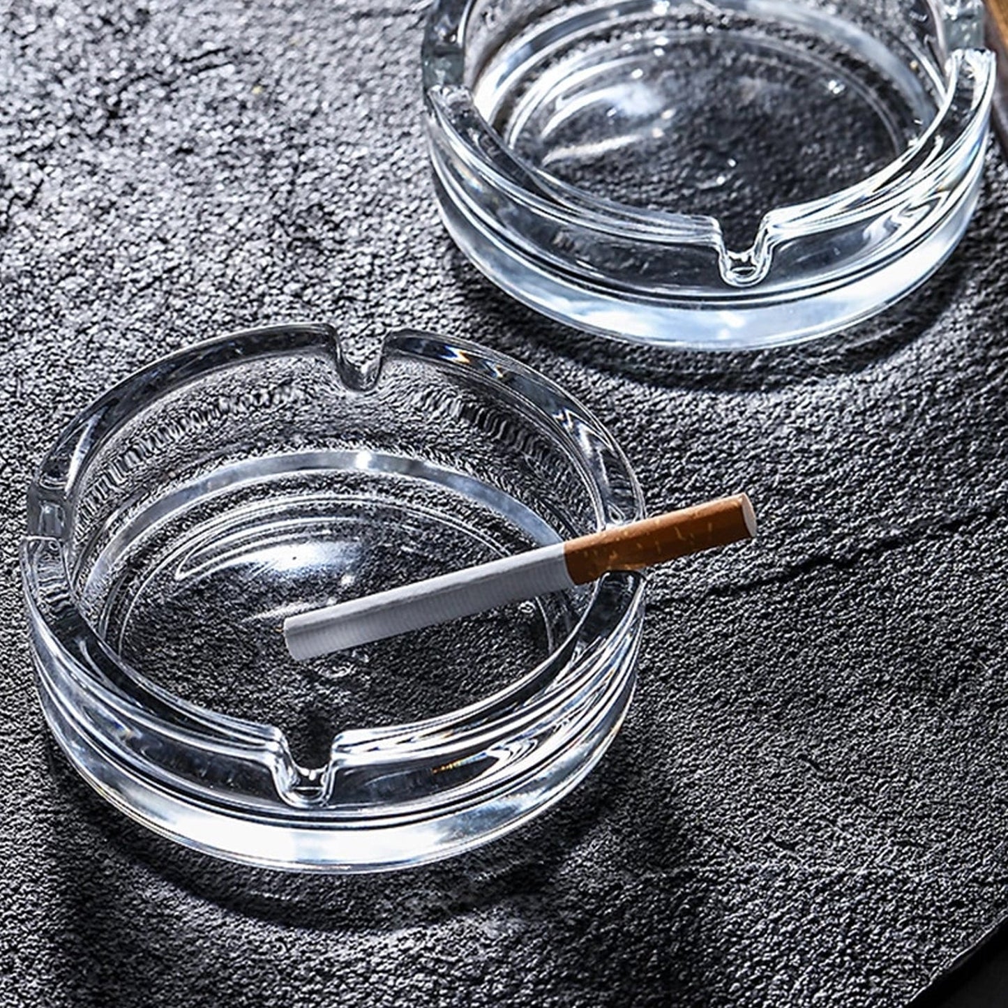Decorative crystal glass ashtray enhancing the aesthetic of any room.