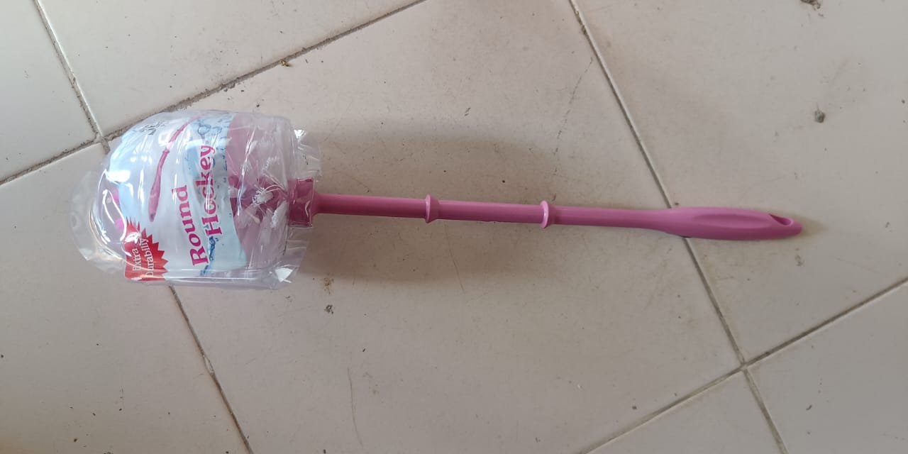 Durable plastic toilet cleaner brush for daily bathroom hygiene.