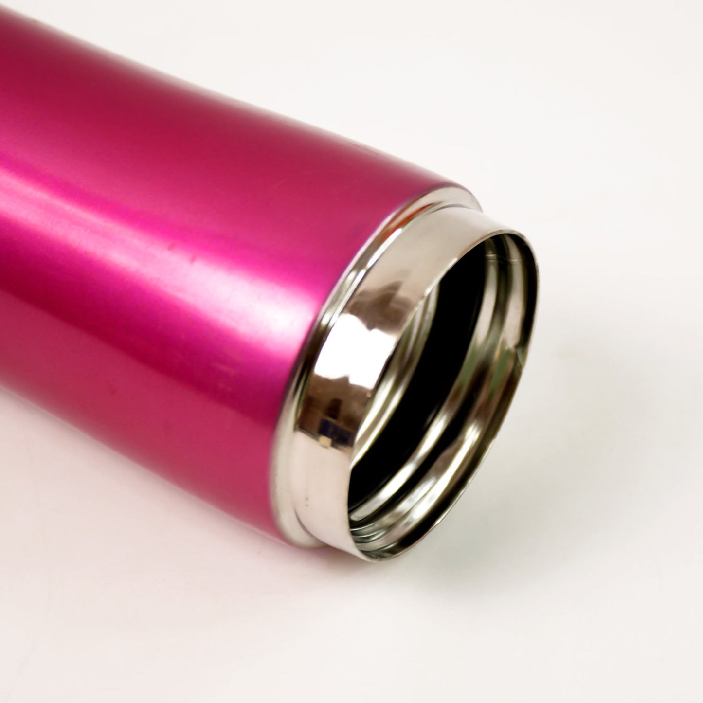 Exterior shot of a stylish stainless steel travel water bottle