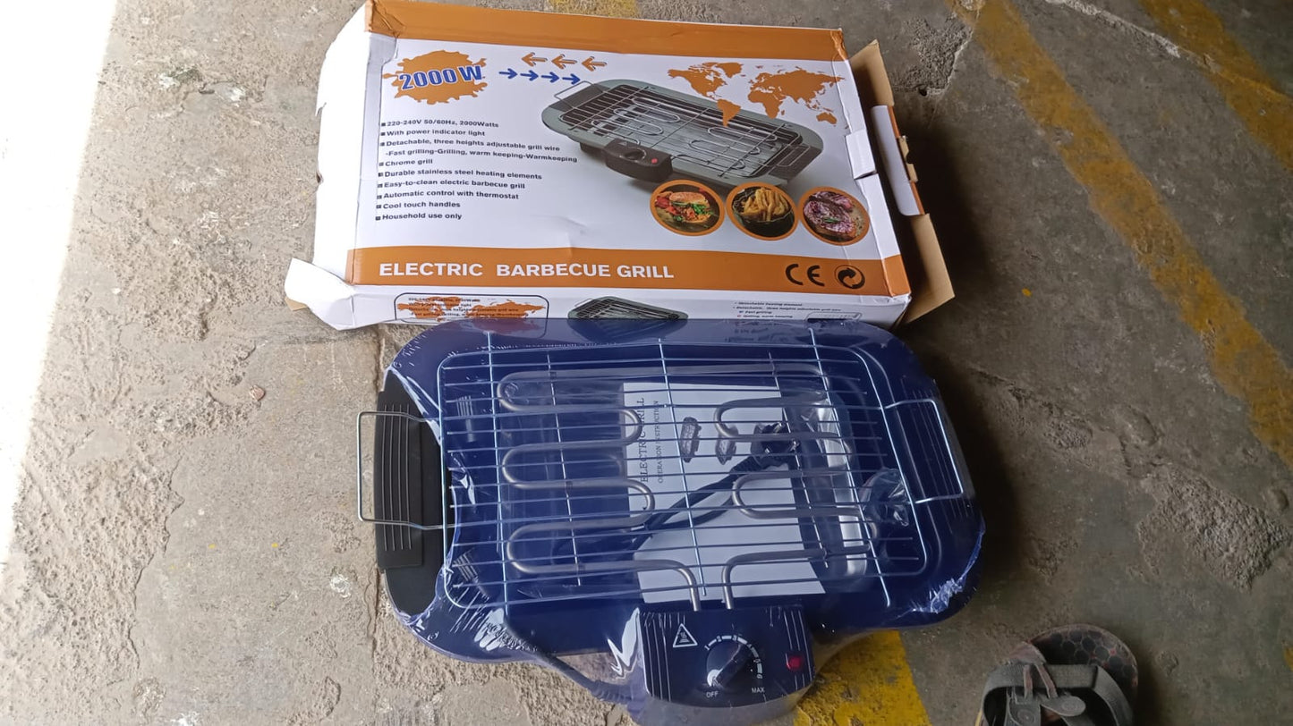 Side view of the portable electric barbecue grill, showcasing its sleek design.