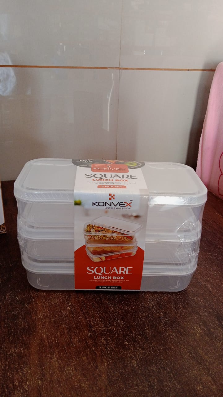 Konvex plastic lunch boxes filled with fresh fruits and vegetables, showcasing meal prep.
