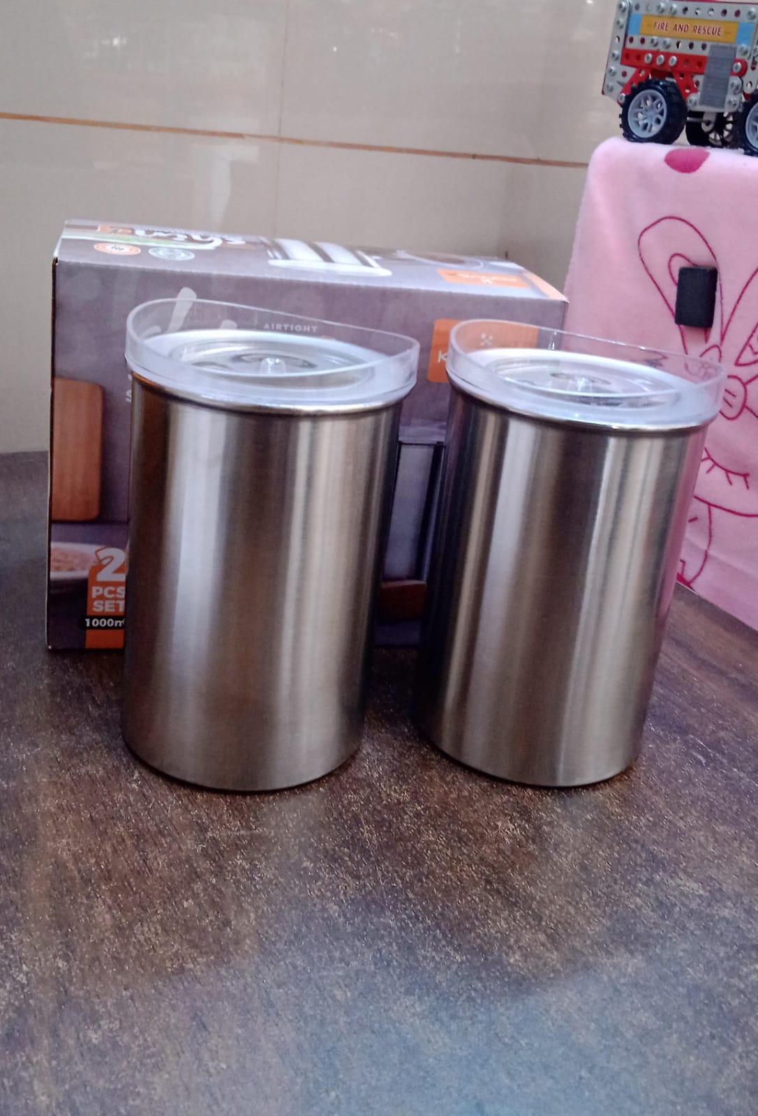 Stainless steel airtight containers from Konvex, perfect for storing dry goods like snacks and pulses.