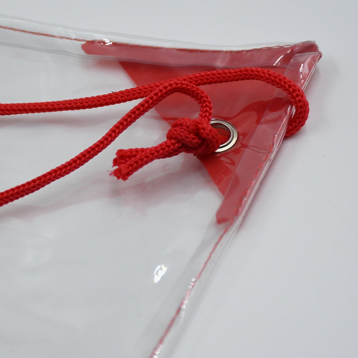 ClassiCarry clear plastic pouch, waterproof and perfect for concerts, sports, and travel.