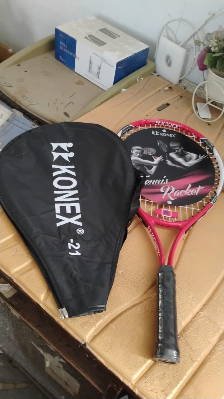 Protective cover zipped on professional tennis racket for easy carry