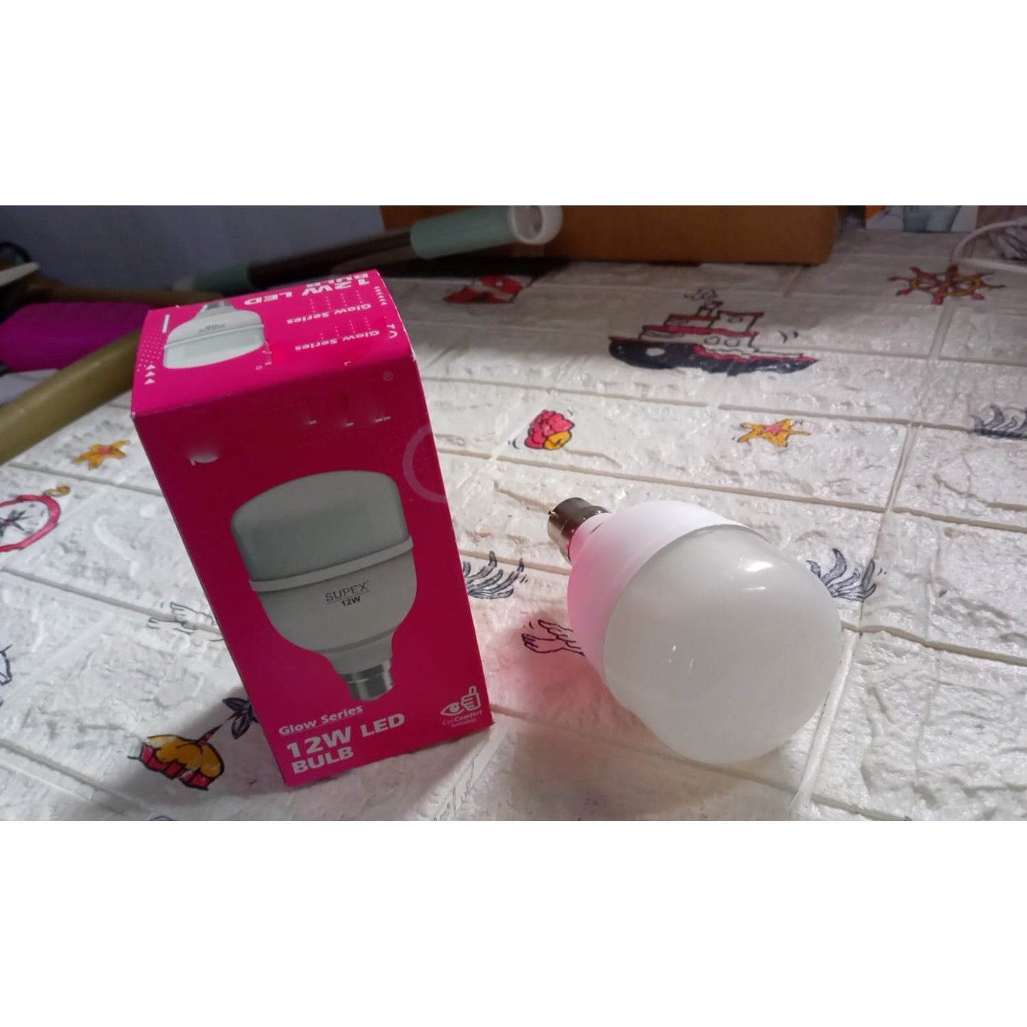 Single 12W LED bulb, highlighting its compact and efficient design.