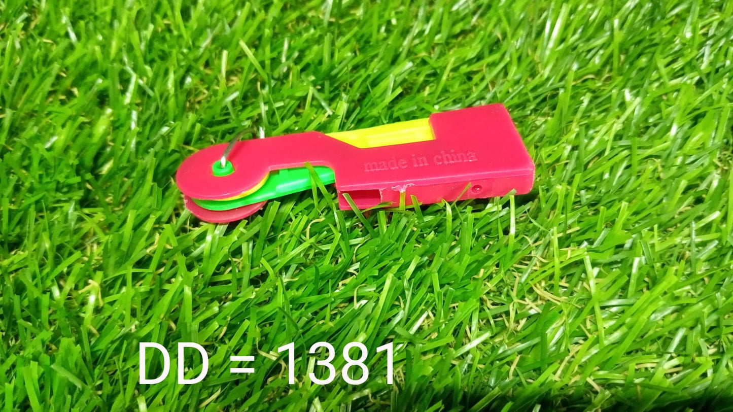 Detailed close-up of the automatic needle threader for precise threading.