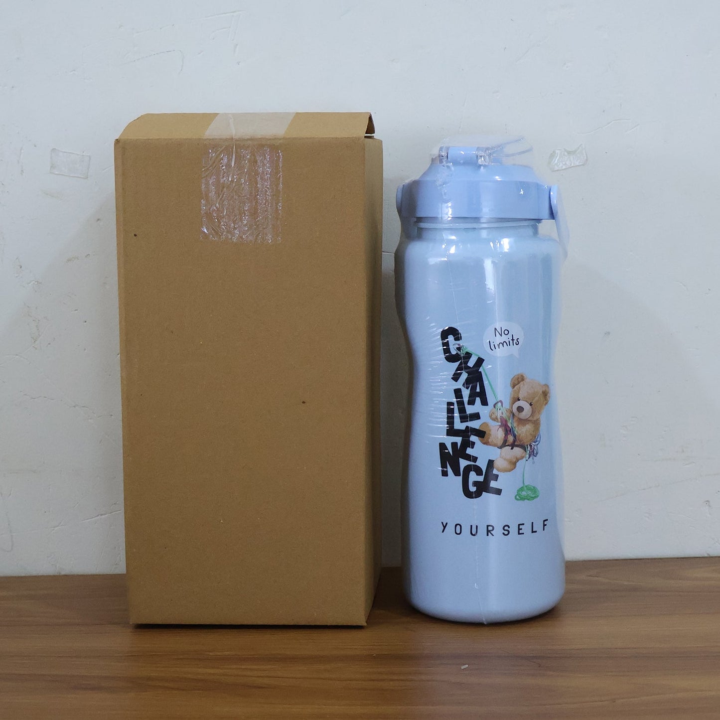 Compact and lightweight leak-proof water bottles with flip-top lids and handles