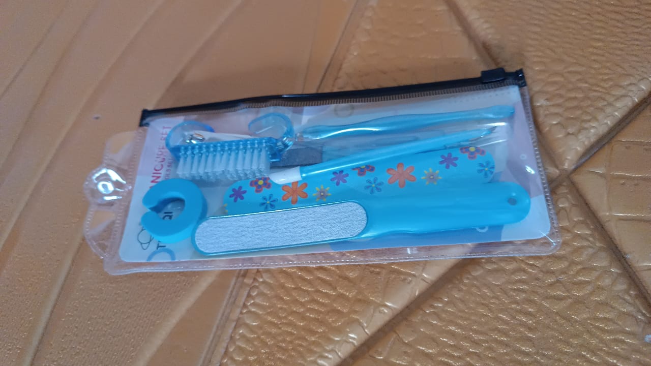 Top view of the 8-in-1 manicure set featuring professional nail care tools