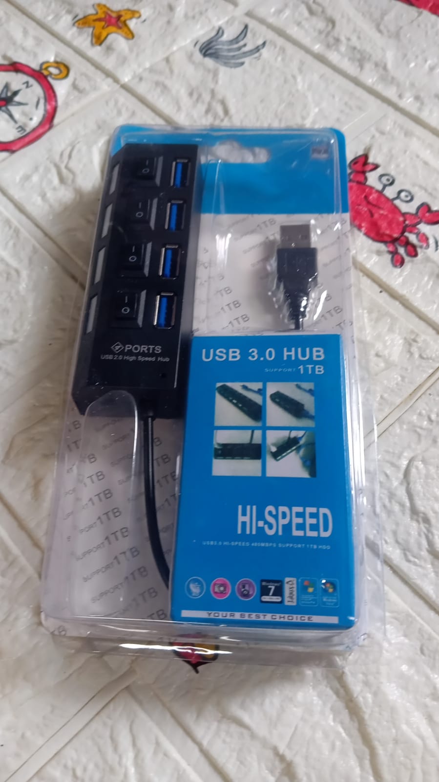 Compact 4 Port USB Hub demonstrating its multiple connectivity options.