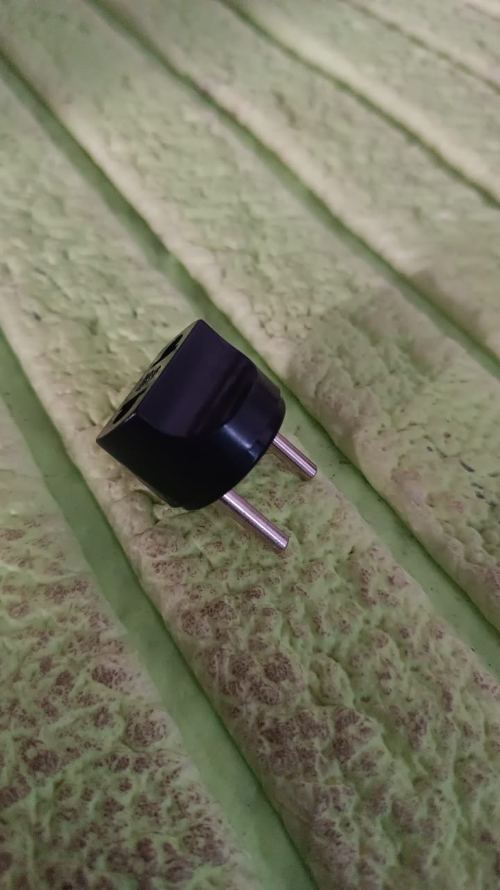 Compact handheld 2 Pin Plug Adapter, ideal for travel in India