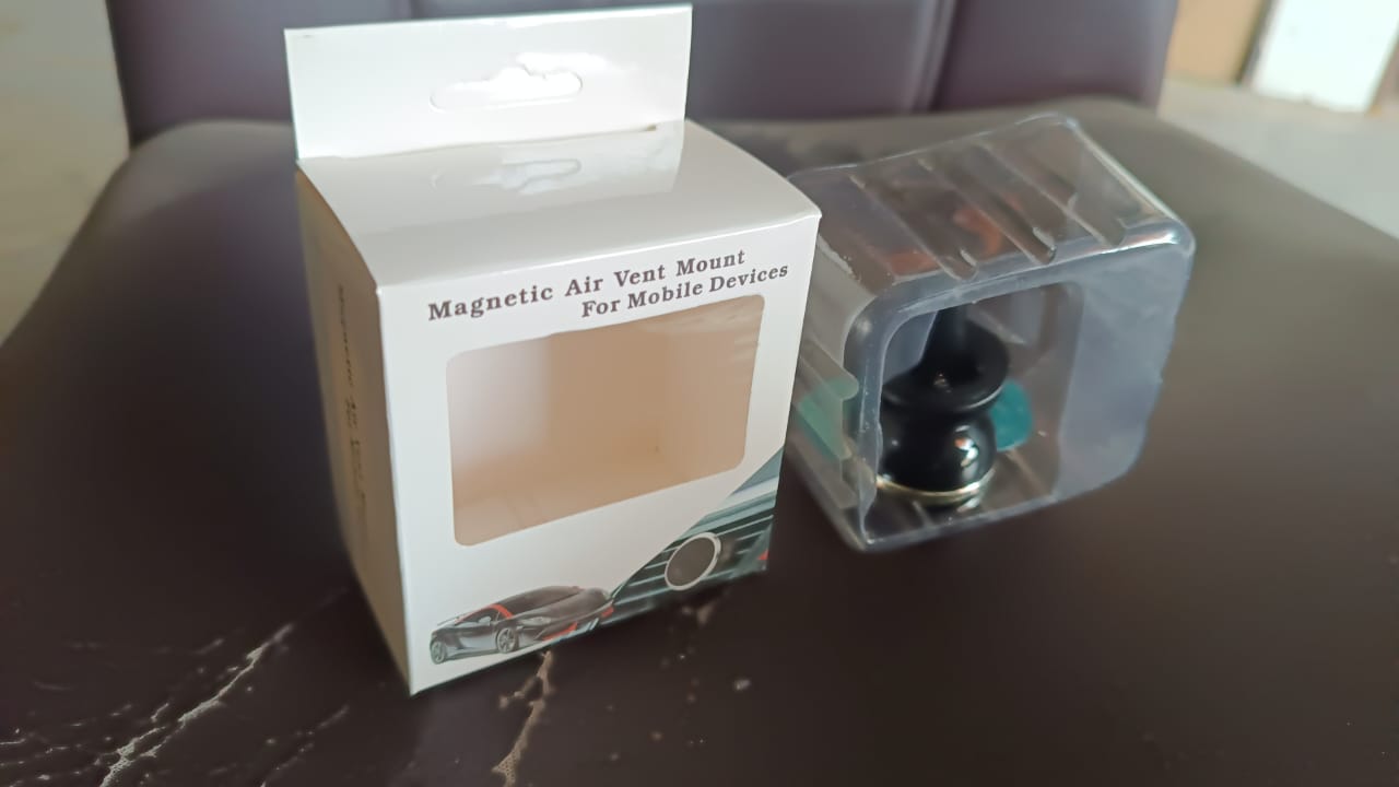 Universal magnetic car mobile holder installed in car interior