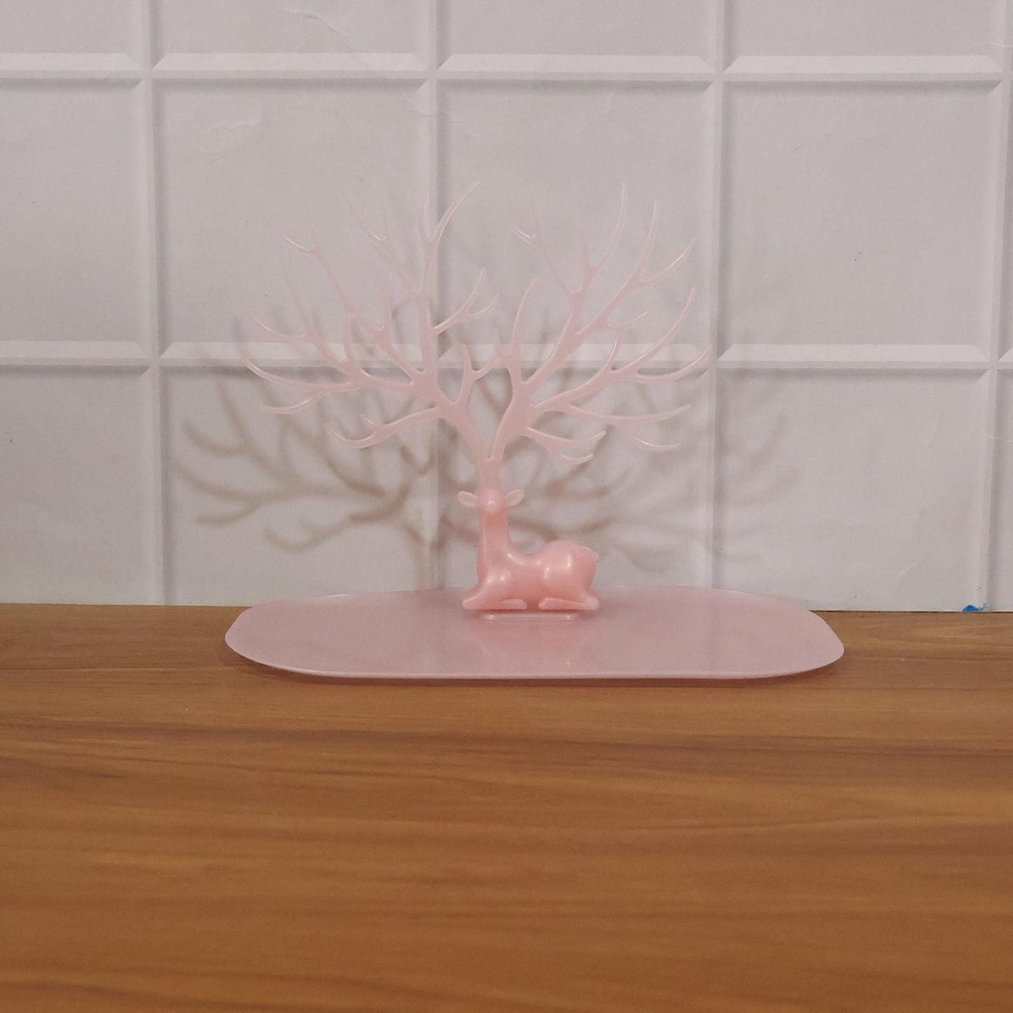 Back view of the large pink deer jewelry organizer stand, India