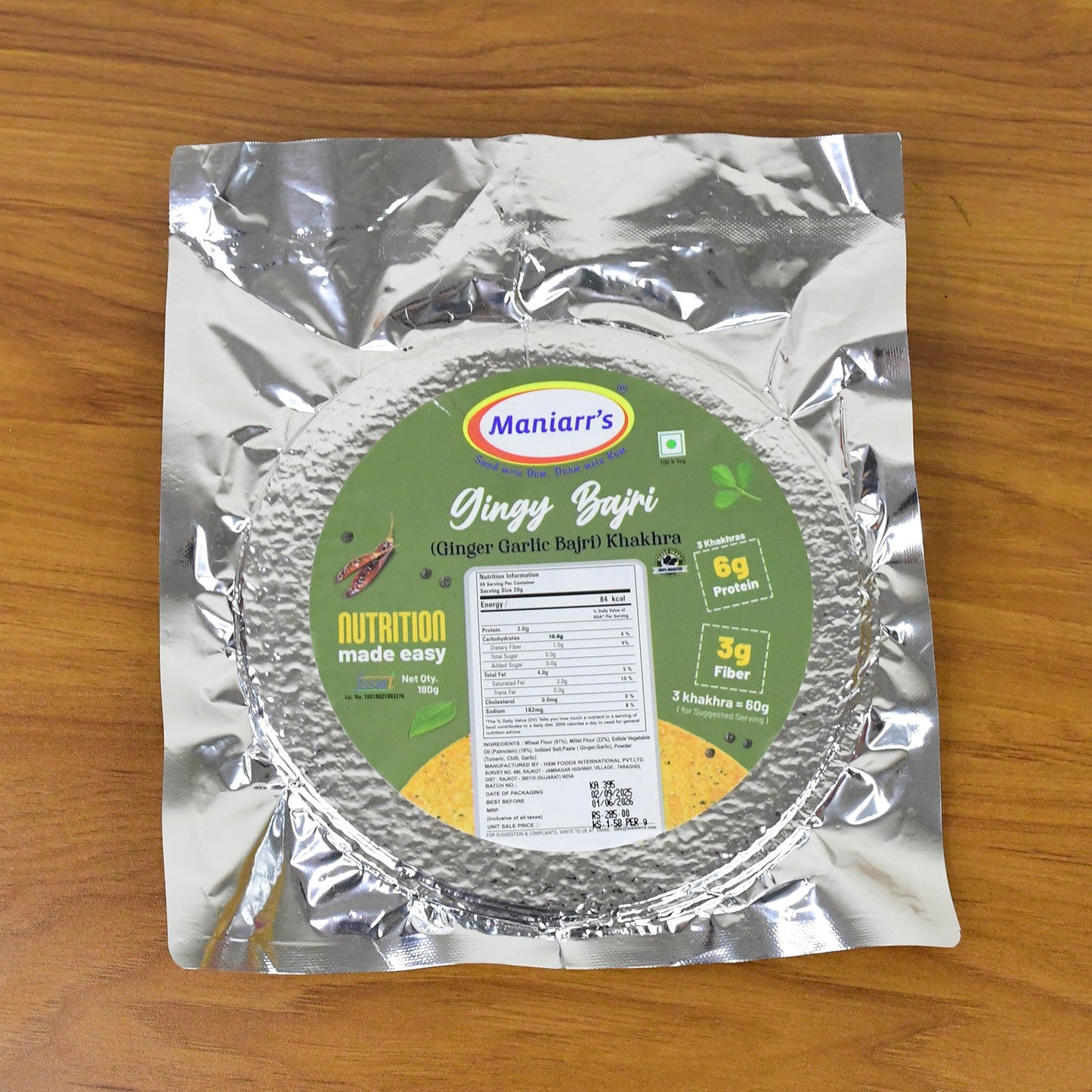 Lifestyle shot: Maniarr's Bajri Khakhra on a tray with tea, ideal for evening snacks.