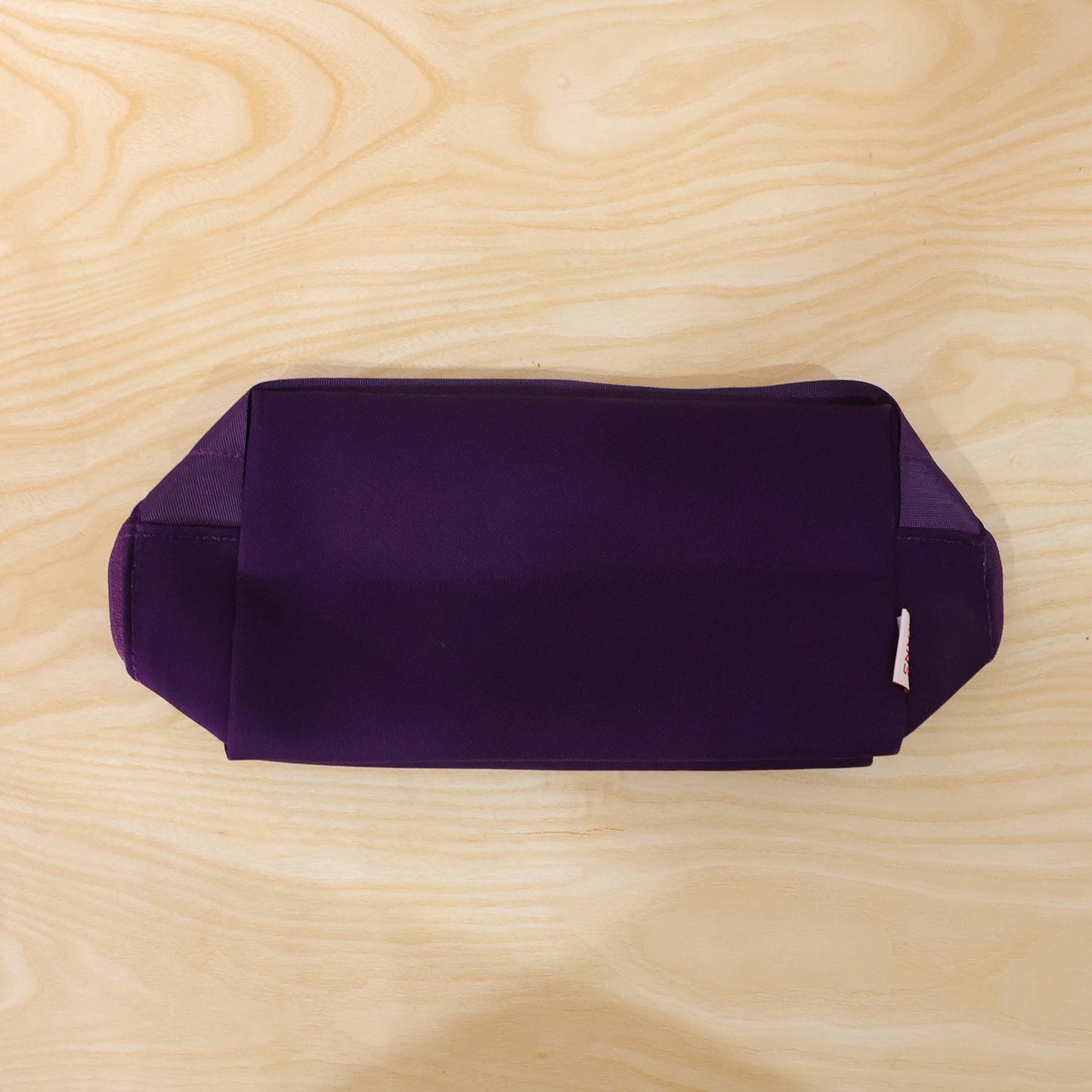 Travel makeup organizer bag in use, waterproof design