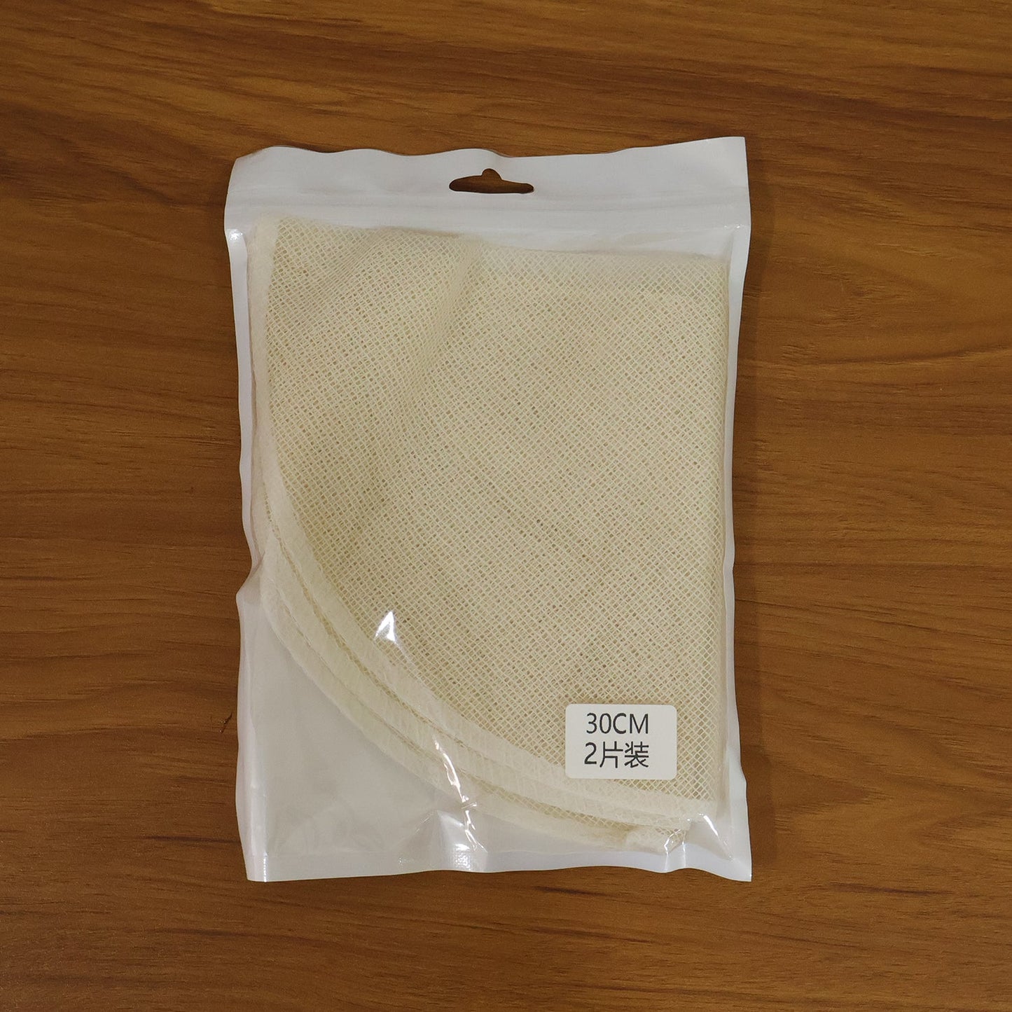 Cotton steam cloth placed in bamboo steamer for cooking