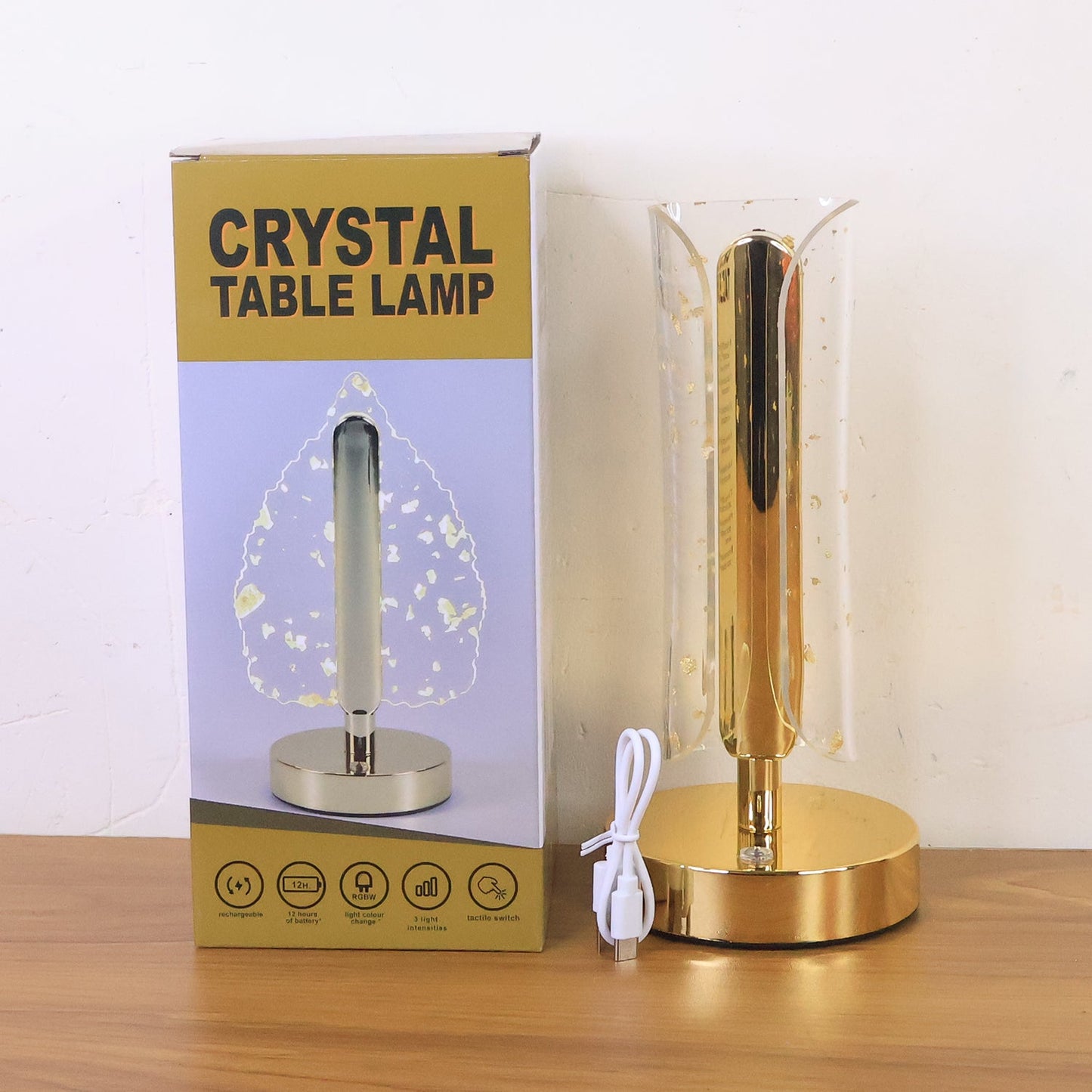 Glow of golden crystal table lamp enhancing living room décor with soft LED light