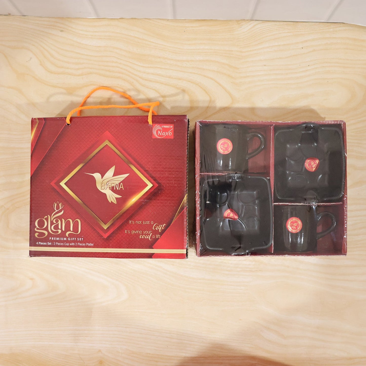 Play Station ceramic mug and serving bowl set presented in its attractive gift box, ideal for gifting.