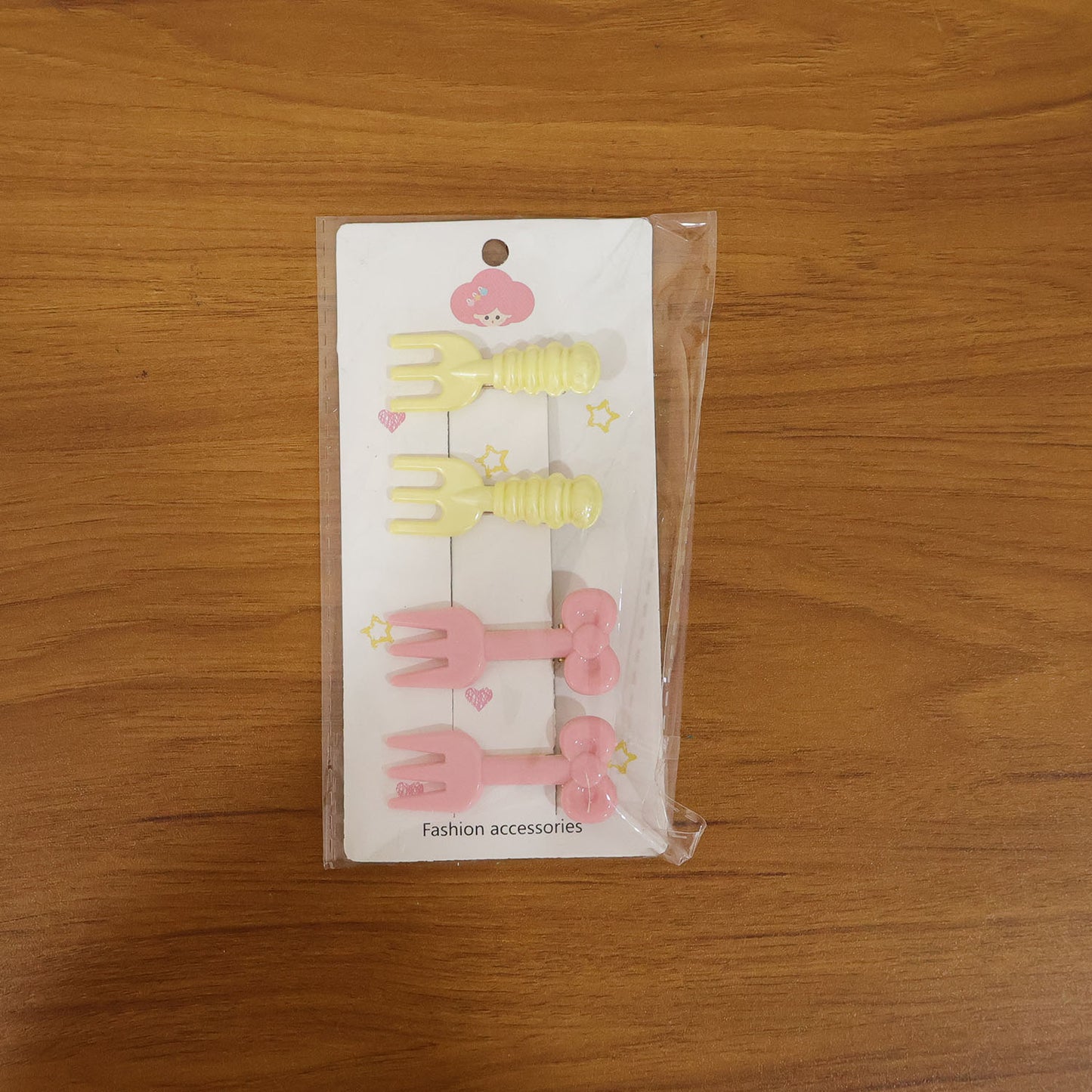 Mini fork hair clips used for styling hair in a casual look