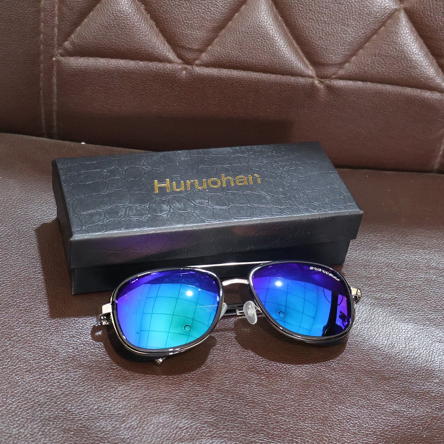 Lifestyle image of polarized aviator sunglasses being worn outdoors
