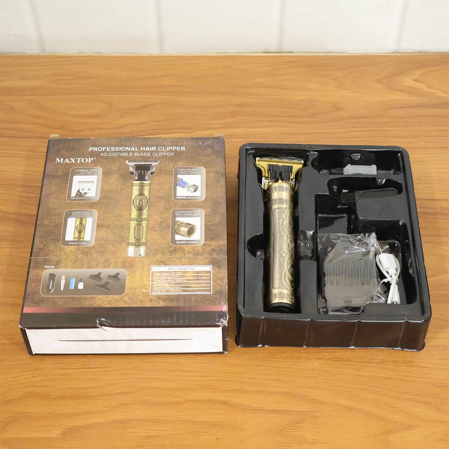 Compact electric hair trimmer for home grooming and styling use