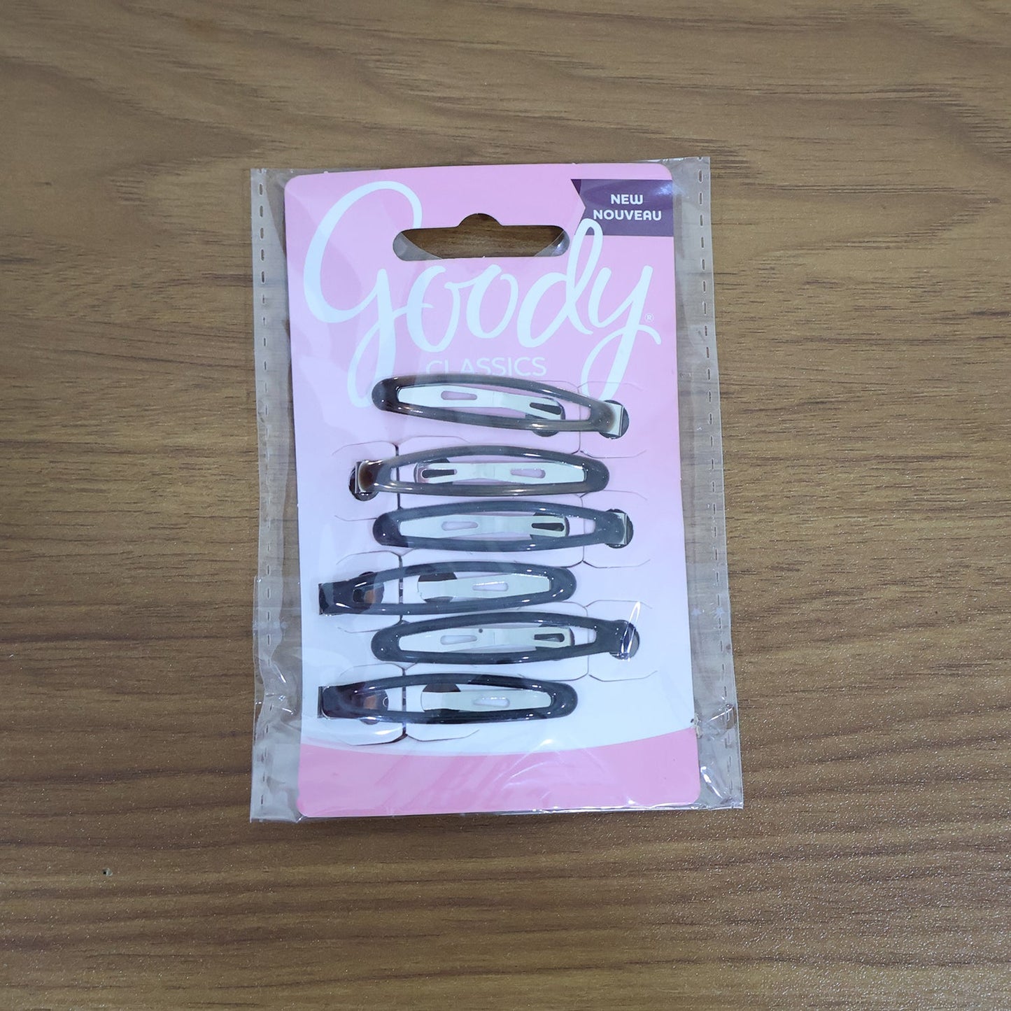 Model wearing snap hair clips styled in wavy hair