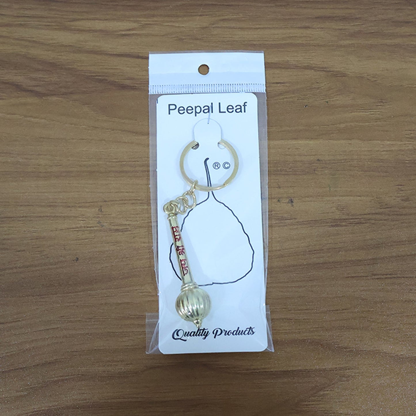 Complete view of Jai Shree Ram mace design golden metal keychain accessory