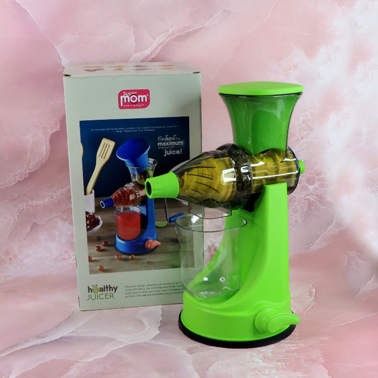 Compact manual juicer stored neatly in kitchen space
