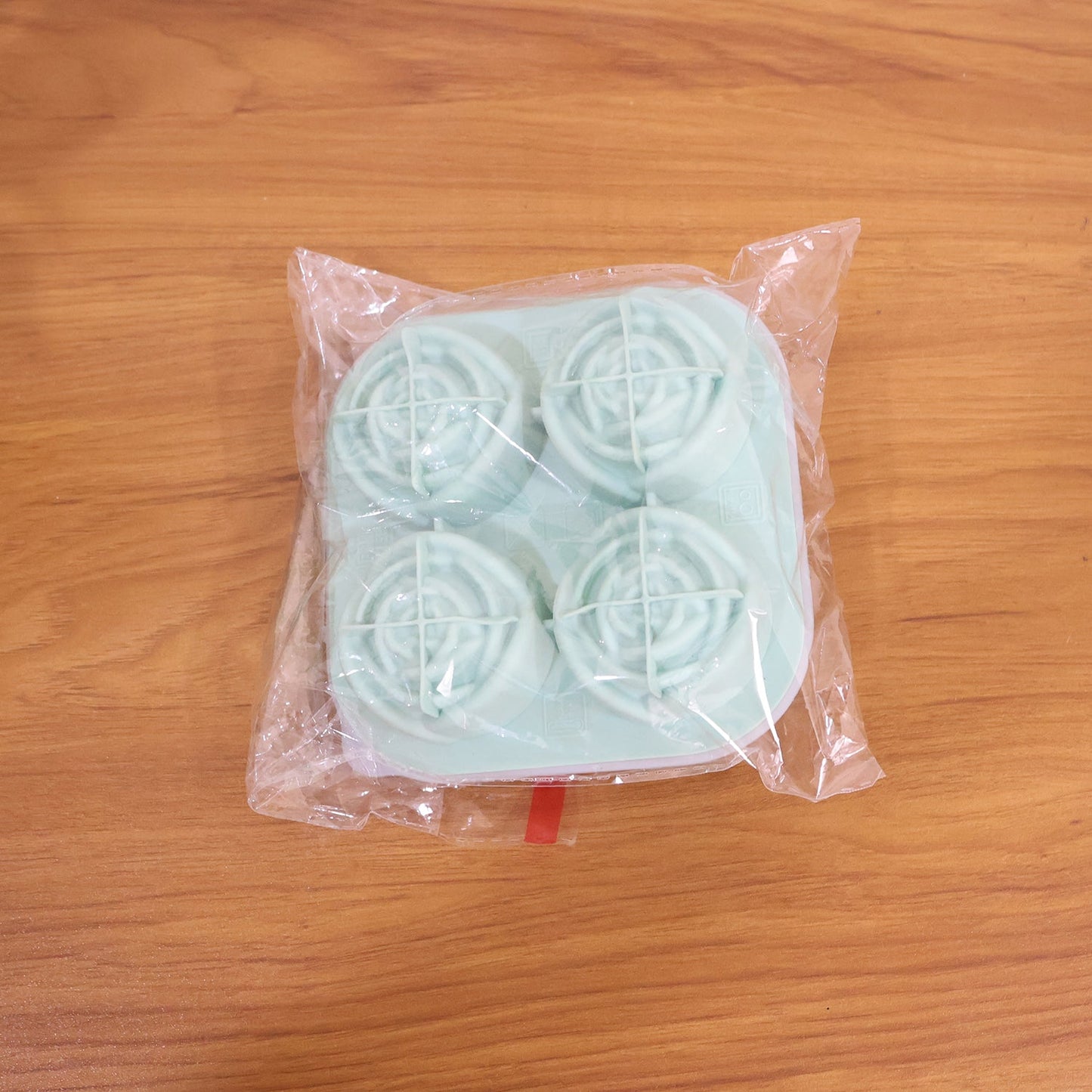 Rose shape ice cube tray used to make decorative ice cubes in drinks