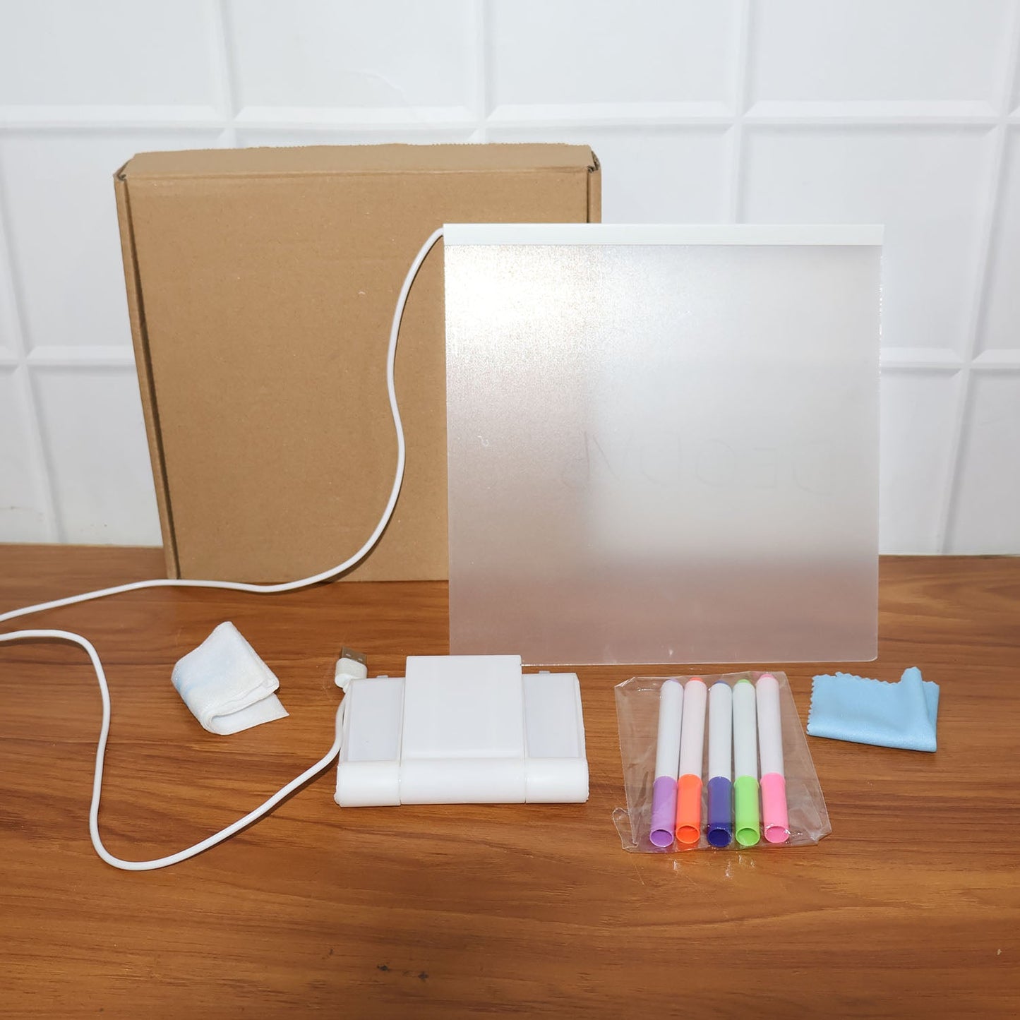 LED writing board in use with vibrant illuminated glow