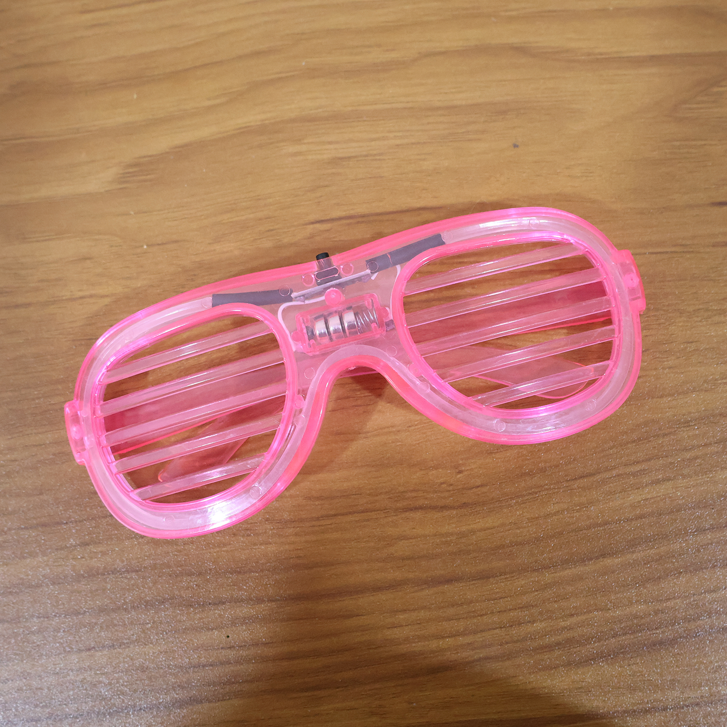 LED light-up party glasses being worn at a night event