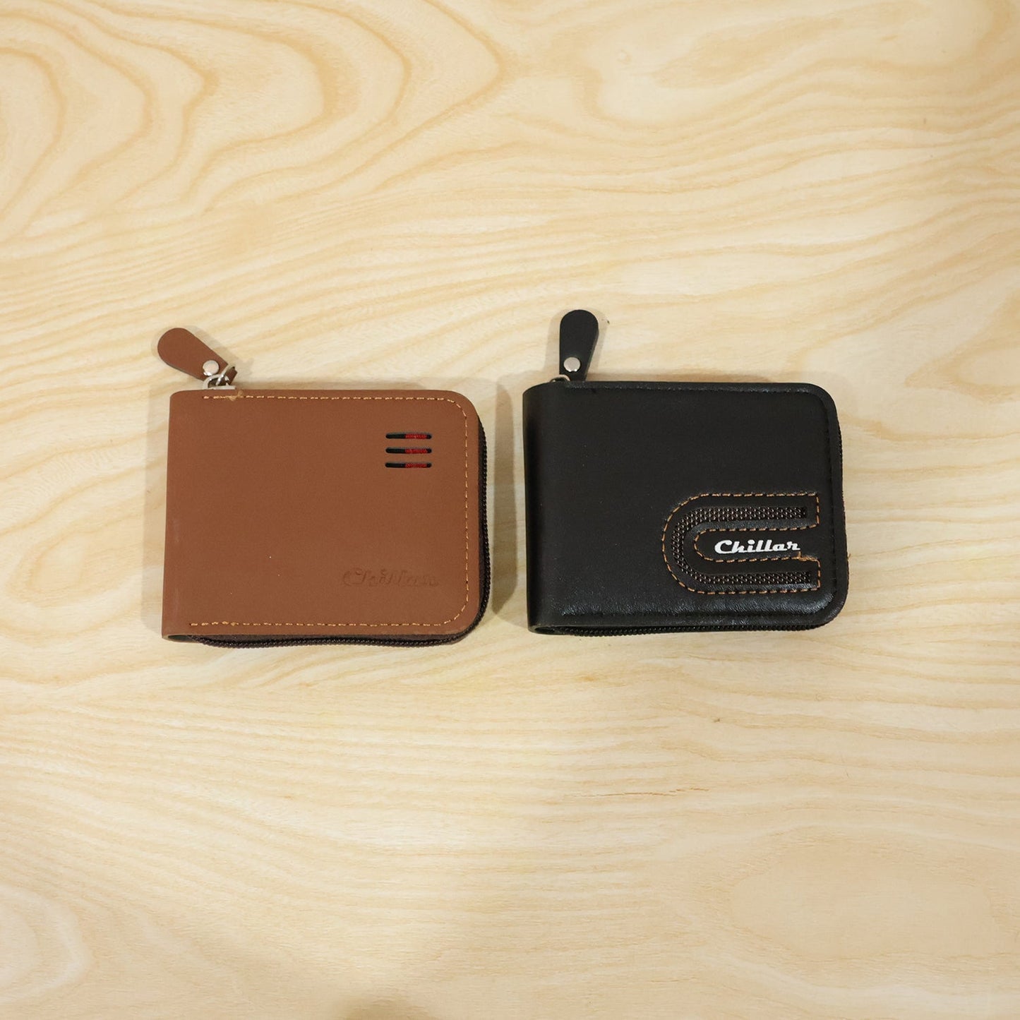 Live shot of man holding zip-around card holder wallet showing texture